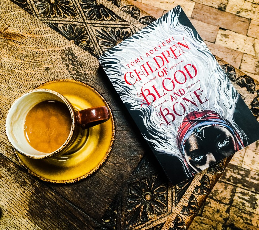 book and a cup of coffee children of blood and bone